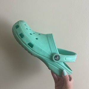 teal crocs